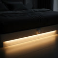 MotionGlow LED Smart Sensor Light Strip glowing under bed